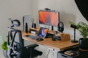home office minimal laptop headphones desk setup